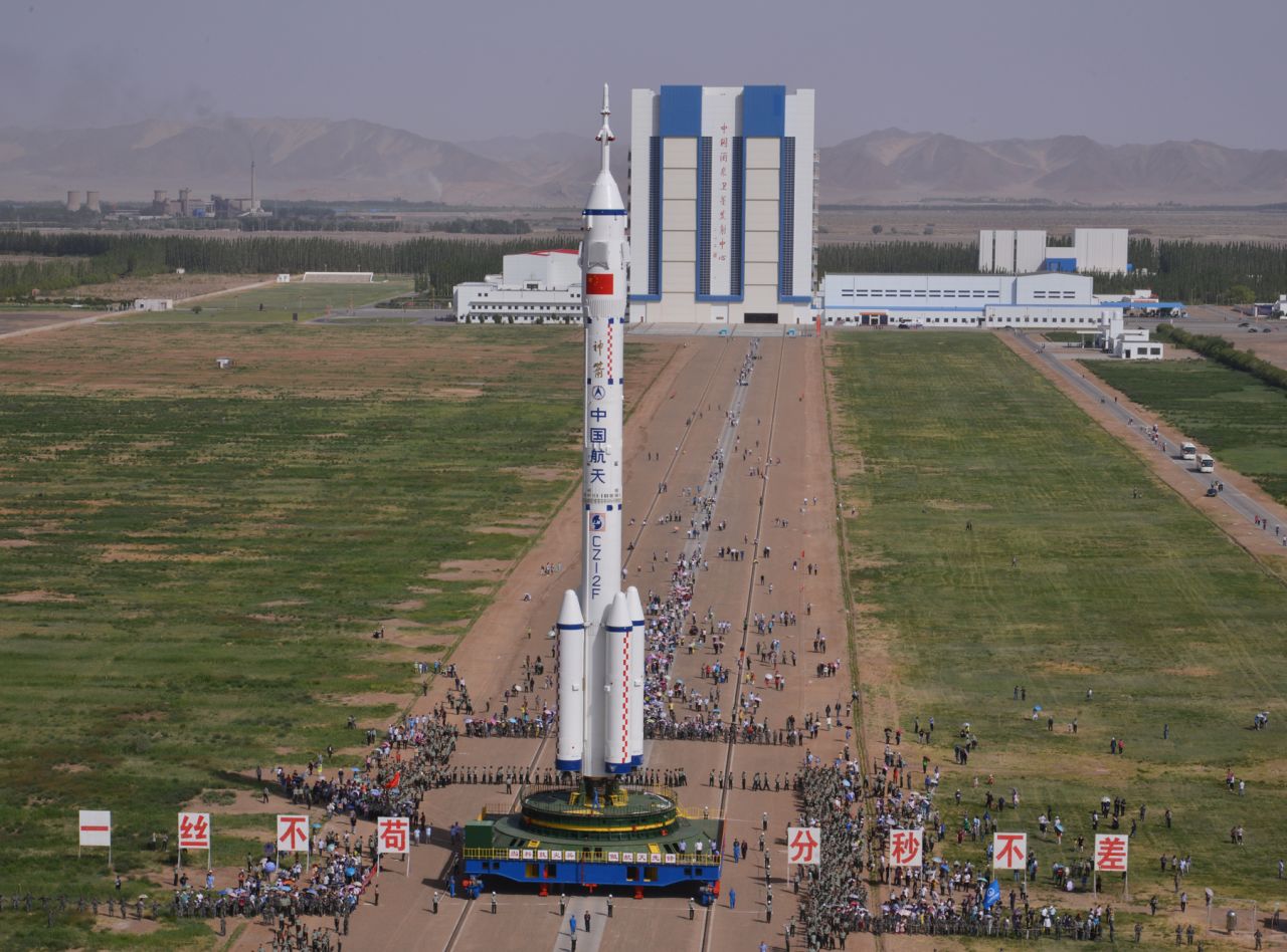 The Shenzhou-10 spacecraft is transferred to the launch site at the Jiuquan Satellite Launch Center on the day of the launch. 