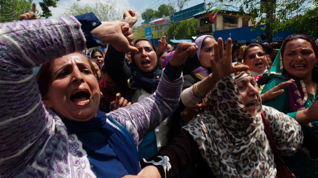 Contract workers and government employees shout slogans during a protest in Srinagar, India. 