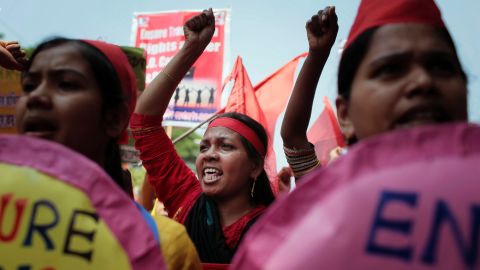Garment workers and activists shout during a May Day rally demanding a better work environment in Dhaka, Bangladesh.