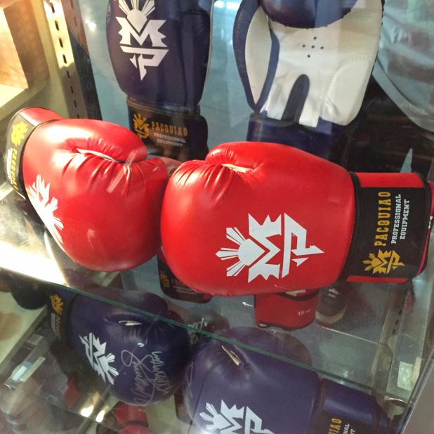 Official boxing gloves are the best-selling item at the Official "Team Pacquiao" store.