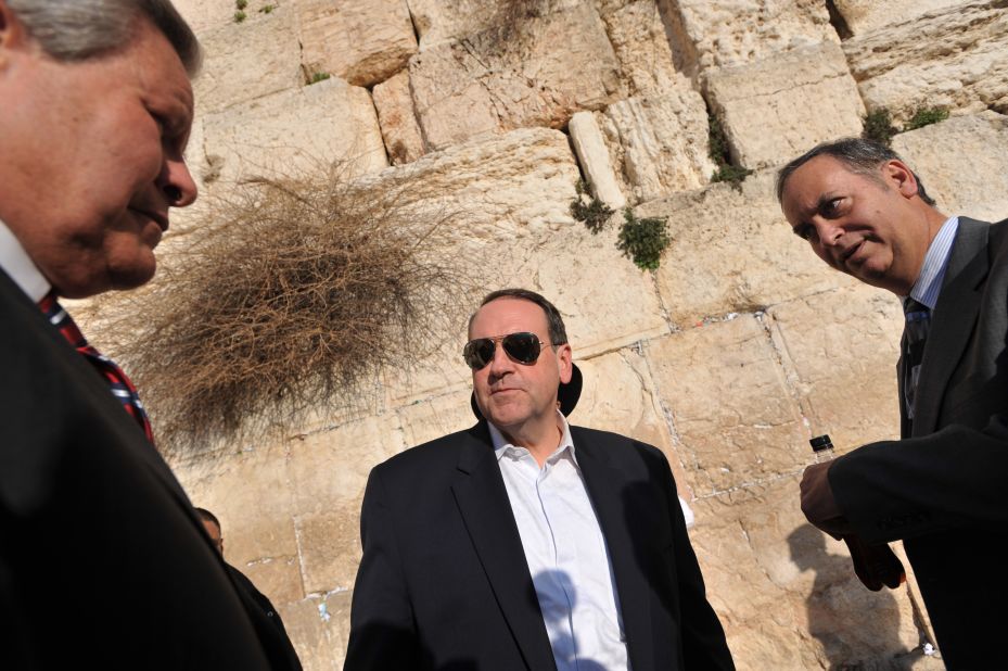 Huckabee, center, visits the Western Wall in Jerusalem on February 1, 2010. 