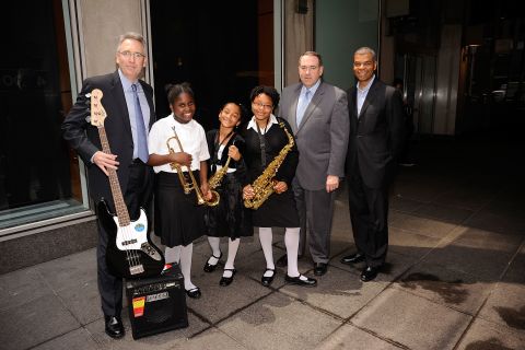 Huckabee (second from right), students and others attend the May 14, 2010, NAMM Foundation Wanna Play Fund event at Fox News studios in New York. The initiative, in conjunction with the VH1 Save the Music Foundation, includes instrument donations.