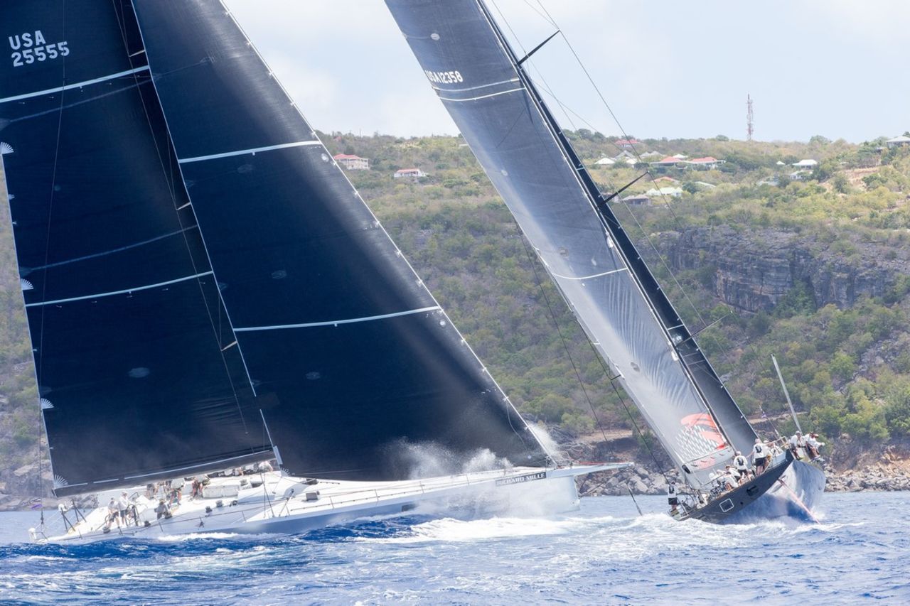 Rambler 88 and Comanche steer towards the shore during one of their compelling race tussles.