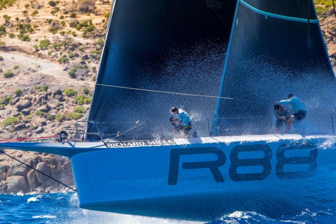 Crew members get a drenching as Rambler 88 cuts a path through the water during one of the four Maxi 1 class races off the coast of the Caribbean island of Saint-Barthelemy.