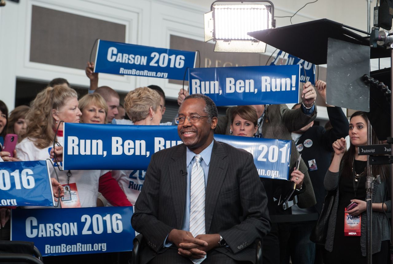 Carson is surrounded by supporters as he waits to be interviewed at the annual Conservative Political Action Conference (CPAC) at National Harbor, Maryland, outside Washington on February 26, 2015.