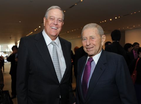 David Koch and Chairman of the Board and Chief Executive Officer of Transammonia Ronald P. Stanton attend the 2011 David Rockefeller Award Luncheon at The Museum of Modern Art on March 8, 2011 in New York City.