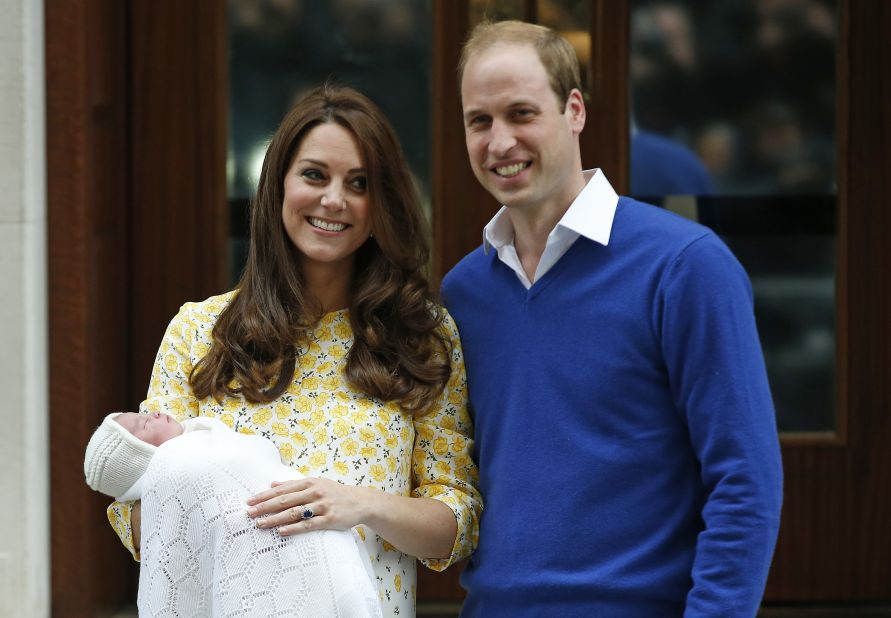 William and Catherine are photographed leaving the hospital after Charlotte's birth.