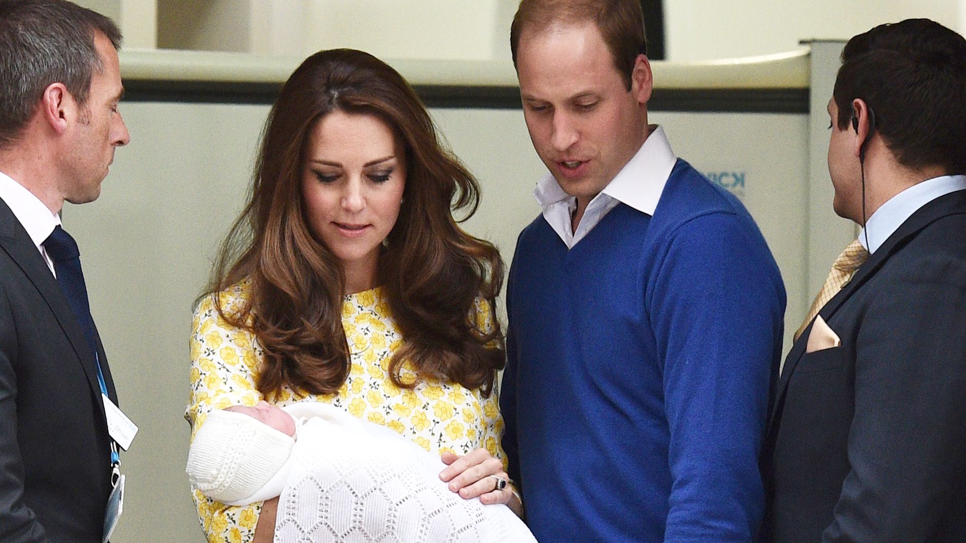 William and Catherine present their newborn daughter as they leave a London hospital in May 2015.