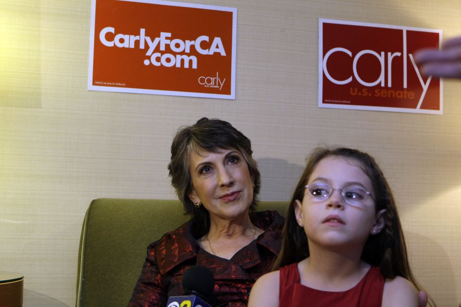 Fiorina, left, watches election results with granddaughter Kara Tribby, 7, in her hotel room at the Hyatt Regency Irvine, November 2, 2010, in Irvine, California. 