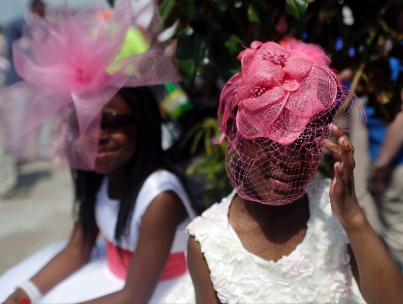 Two girls prepare for the Kentucky Derby on Saturday, May 2, 2015.