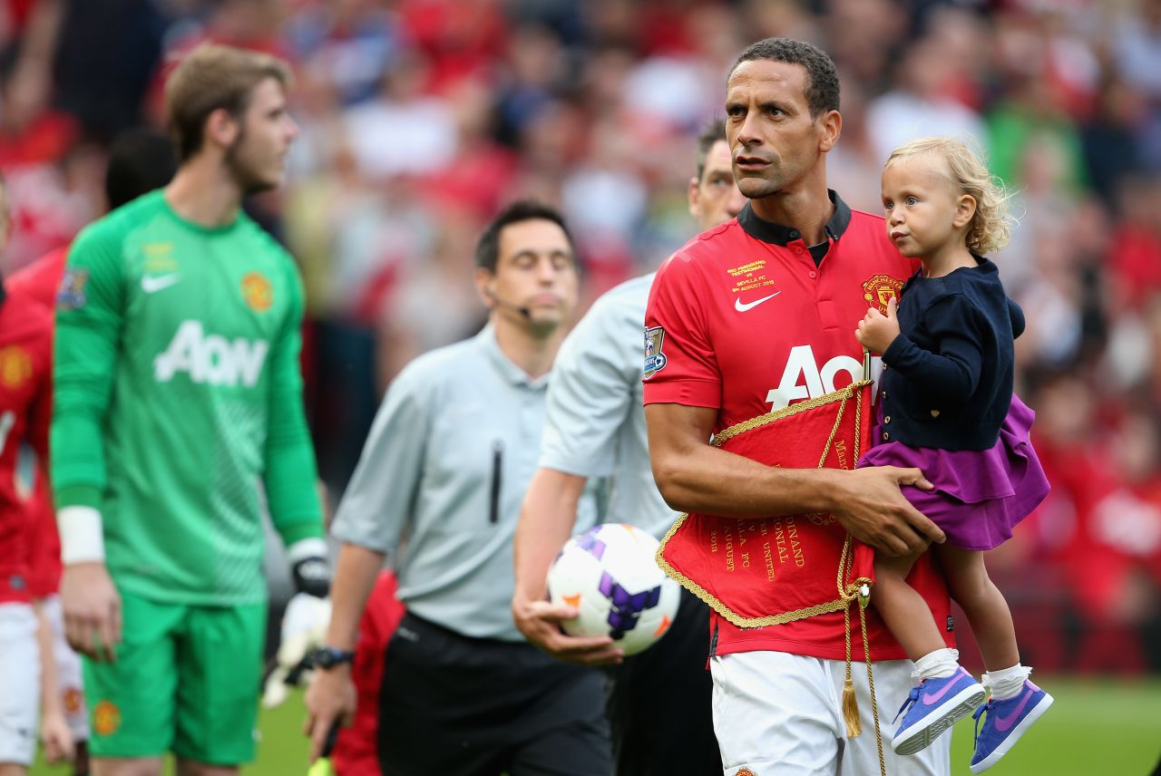 Ferdinand is pictured with his daughter Tia before his testimonial match between Manchester United -- where he spent 12 years -- and Sevilla in August 2013.