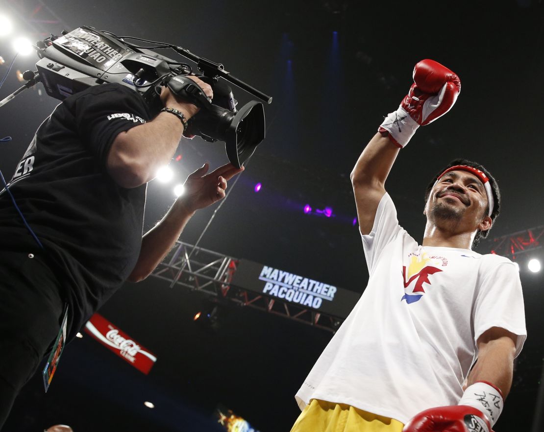 Manny Pacquiao acknowledges the crowd before the start of his world welterweight championship bout against Floyd Mayweather Jr.