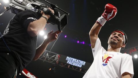 Manny Pacquiao acknowledges the crowd before the start of his world welterweight championship bout against Floyd Mayweather Jr.