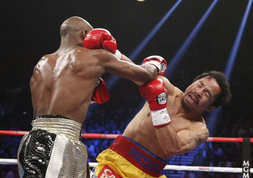Floyd Mayweather is now 48-0 with 26 knockouts. Pacquiao is 57-6-2 with 38 knockouts. <br />