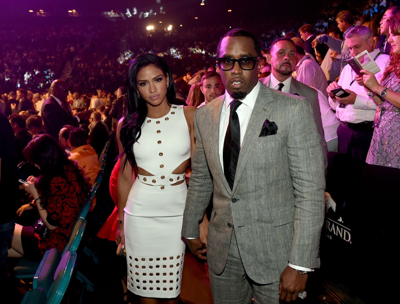  Model Cassie Ventura, left, and Sean "Diddy" Combs pose ringside.