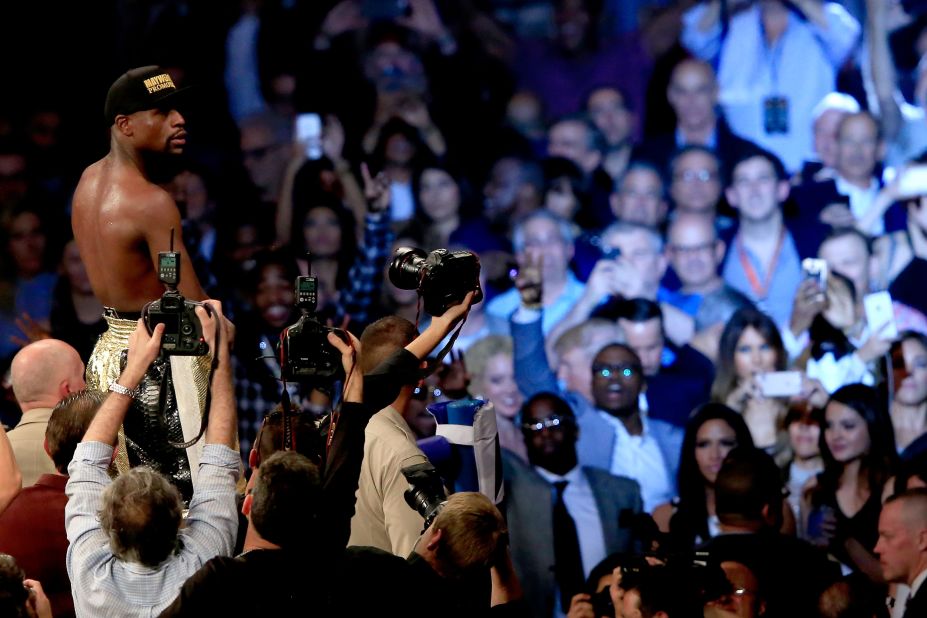 Floyd Mayweather Jr. looks at the crowd as he celebrates his unanimous decision victory against Manny Pacquiao in Las Vegas on Saturday, May 2.