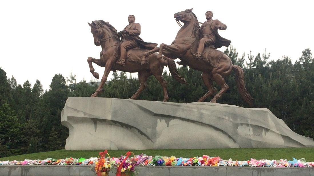 Twin statues honor the late leaders of North Korea Kim Il Sung and Kim Jong Il. Visitors are routinely taken here to pay their respects and lay flowers at the statue, Saturday, May 2, 2015.