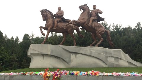 Twin statues honor the late leaders of North Korea, Kim Il Sung and Kim Jong Il. Visitors to Pyongyang are routinely taken to pay their respects and lay flowers at the monument.