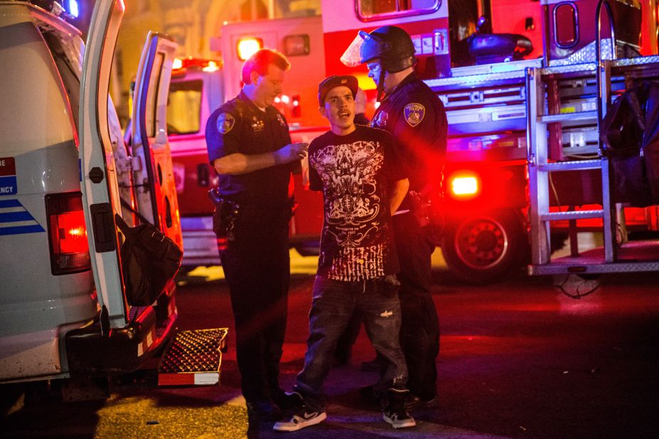 Police detain a man on May 2 in Baltimore's Sandtown neighborhood.