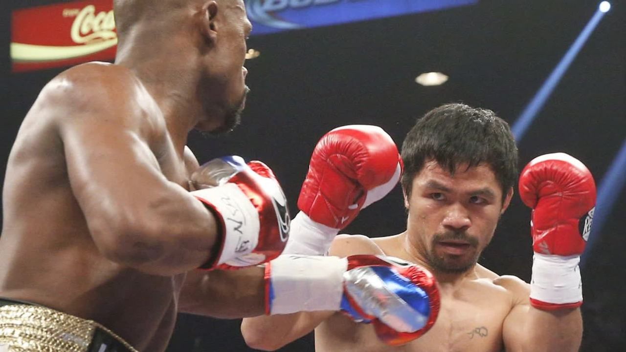 cnnee pkg saenz mayweather pacman fight reax_00002624.jpg