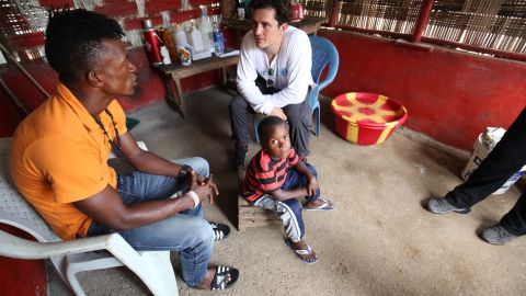 Orlando Bloom visits Ansu Turary and his son Abraham, who are the only remaining members of their family, due to the Ebola outbreak.