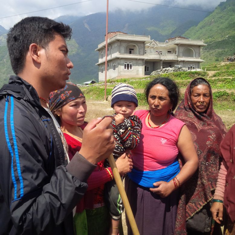 Sunil Bishokerma reaches his family members in Barpak village. "My god, they are okay," he says.