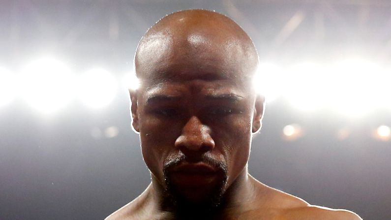Floyd Mayweather Jr. stands in the ring before the <a href="index.php?page=&url=http%3A%2F%2Fwww.cnn.com%2F2015%2F05%2F02%2Fsport%2Fgallery%2Fpacquiao-mayweather%2Findex.html">welterweight unification championship bout</a> on Saturday, May 2, in Las Vegas. <a href="index.php?page=&url=http%3A%2F%2Fwww.cnn.com%2F2015%2F05%2F03%2Fsport%2Fmayweather-pacquiao-fight%2F">Mayweather outboxed and outmaneuvered Manny Pacquiao</a> to claim a unanimous points victory in the most lucrative boxing match in history, taking his unblemished professional record to 48-0 and cementing his place as one of the greatest fighters of all time. 