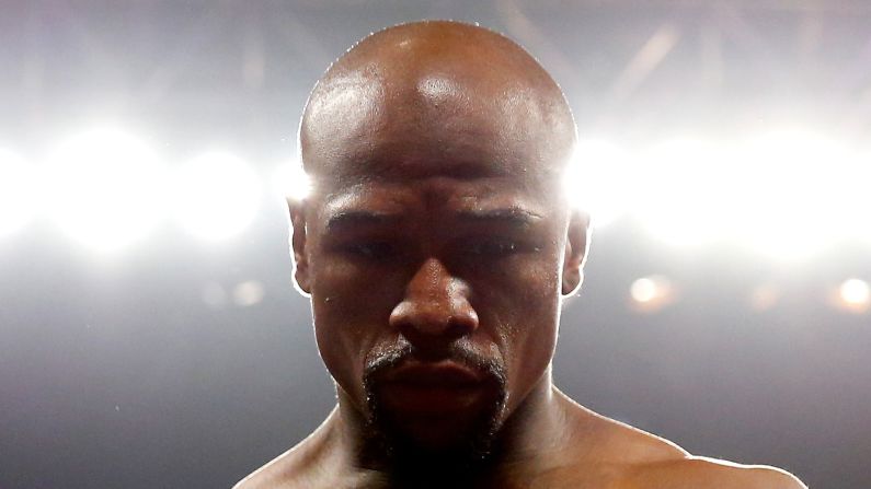 Floyd Mayweather Jr. stands in the ring before the <a href="index.php?page=&url=http%3A%2F%2Fwww.cnn.com%2F2015%2F05%2F02%2Fsport%2Fgallery%2Fpacquiao-mayweather%2Findex.html">welterweight unification championship bout</a> on Saturday, May 2, in Las Vegas. <a href="index.php?page=&url=http%3A%2F%2Fwww.cnn.com%2F2015%2F05%2F03%2Fsport%2Fmayweather-pacquiao-fight%2F">Mayweather outboxed and outmaneuvered Manny Pacquiao</a> to claim a unanimous points victory in the most lucrative boxing match in history, taking his unblemished professional record to 48-0 and cementing his place as one of the greatest fighters of all time.