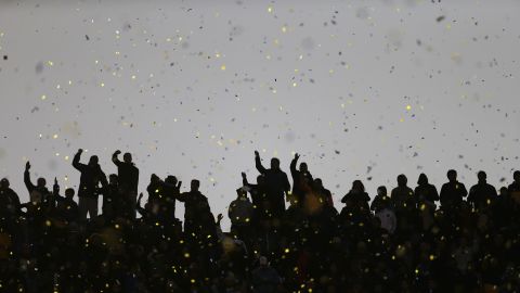Boca Juniors fans cheer for their team during a tournament soccer match against River Plate in Buenos Aires on Sunday, May 3.