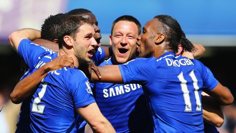 Branislav Ivanovic, from left, John Terry and Didier Drogba of Chelsea celebrate winning the Premier League title after their match against Crystal Palace in London on Sunday, May 3.