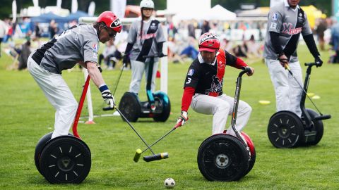 Players compete in a Segway polo match on Friday, May 1, in Cologne, Germany.