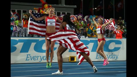 American athletes Maggie Vessey, from left, Chanelle Price and Molly Beckwith-Ludlow celebrate after winning the women's 4 x 800 meters final during the IAAF/BTC World Relays on Sunday, May 3, in Nassau, Bahamas.