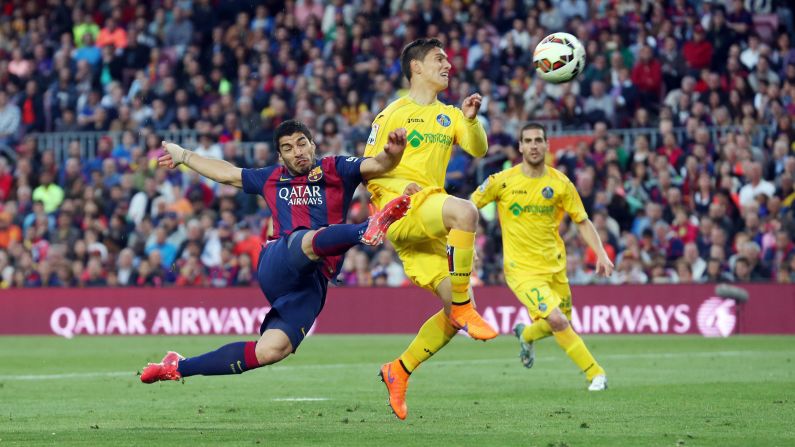 FC Barcelona's Luis Suarez kicks the ball to score the second goal during a match against Getafe CF on Tuesday, April 28, in Barcelona, Spain. 