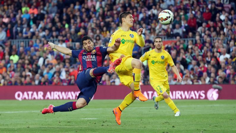 FC Barcelona's Luis Suarez kicks the ball to score the second goal during a match against Getafe CF on Tuesday, April 28, in Barcelona, Spain.