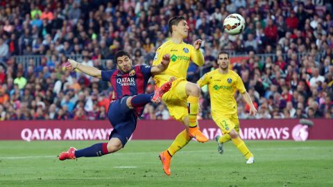 FC Barcelona's Luis Suarez kicks the ball to score the second goal during a match against Getafe CF on Tuesday, April 28, in Barcelona, Spain. 