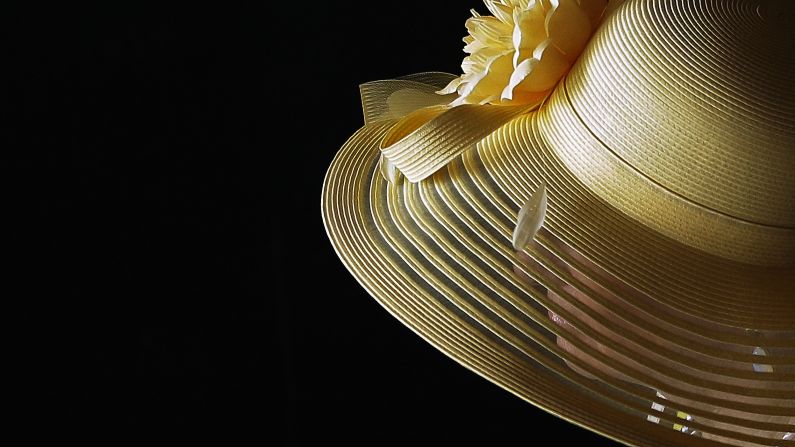 A fan arrives for the Kentucky Derby horse race on Saturday, May 2, in Louisville, Kentucky. <a href="index.php?page=&url=http%3A%2F%2Fwww.cnn.com%2F2015%2F04%2F28%2Fsport%2Fgallery%2Fwhat-a-shot-0428%2Findex.html">See 32 amazing sports photos from last week.</a>