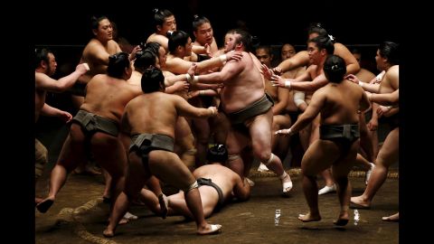 Sumo wrestlers participate in a rowdy training session in Tokyo on Saturday, May 2, ahead of the May Grand Sumo Tournament.