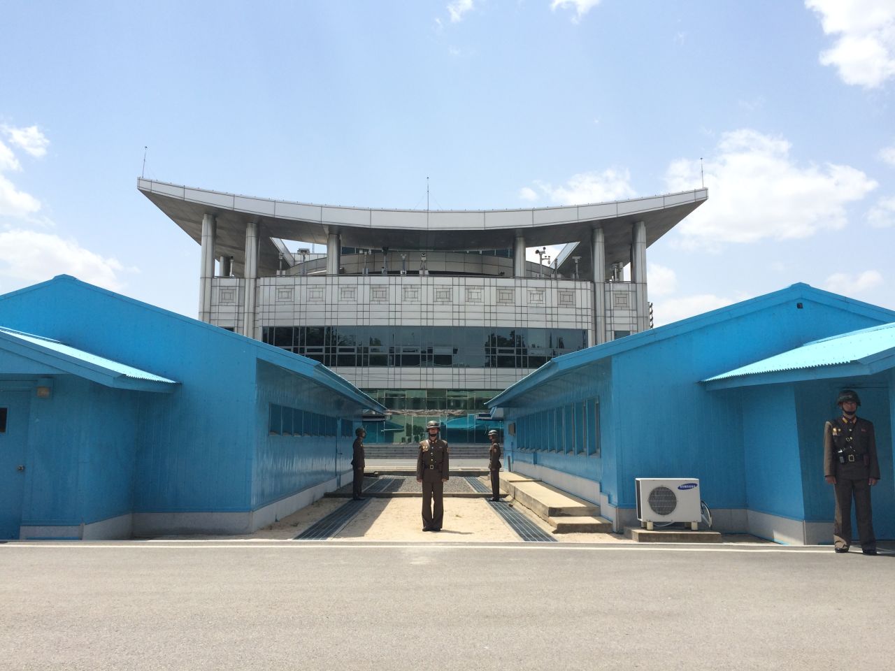 Soldiers stand guard on the North Korean side of the DMZ.