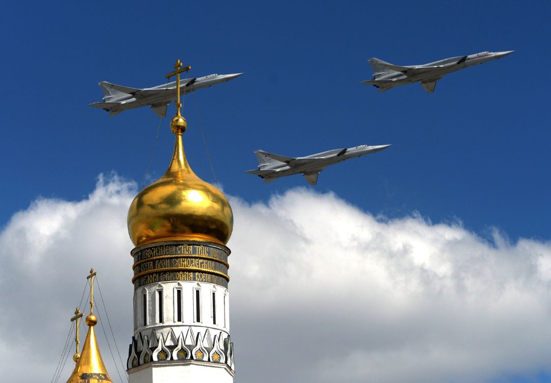 Russian Tupolev Tu-22M supersonic strategic bombers fly above the Kremlin's cathedrals in Moscow on May 5.