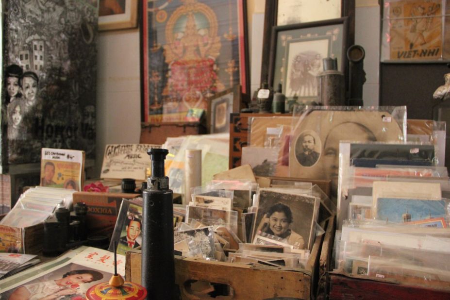 Old photographs sit in boxes for sale in a shop in the western Cambodian city of Battambang. Cambodians fleeing the Khmer Rouge in the 1970s left many family heirlooms behind.