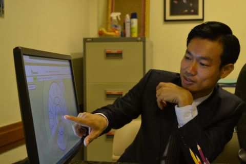 Eng looks over his online family history profile. Even though he's been trying to get other Cambodians to engage in genealogical research, as Mormons are expected to do, he acknowledges that he was a member of the church for many years before he was ready to do so himself.