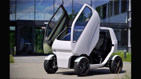 Known as the EOscc2, seen here with its doors open, it has a top speed of 65 km/h (or 40mph) and can travel 50 to 70 kilometers (30 to 44 miles) on a single four-hour full battery charge.