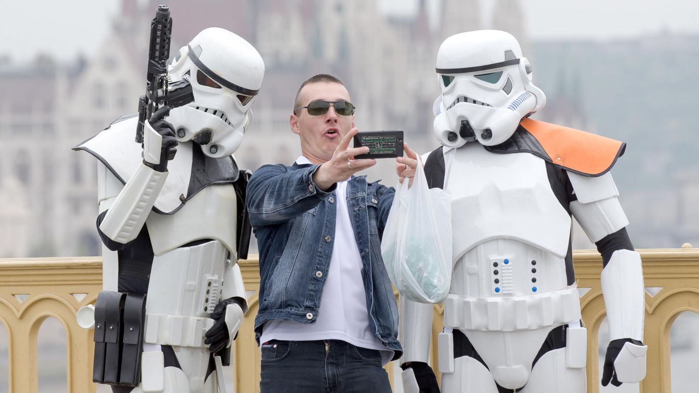 "Star Wars" fans dress as their favorite movie characters on Sunday, May 3, in Budapest. <a href="http://www.cnn.com/2015/05/03/entertainment/gallery/star-wars-day-2015/index.html">"Star Wars Day"</a> is observed around the world on May 4, with fans saying "May the Fourth be with you," inspired by the Jedi mantra "May the Force be with you."
