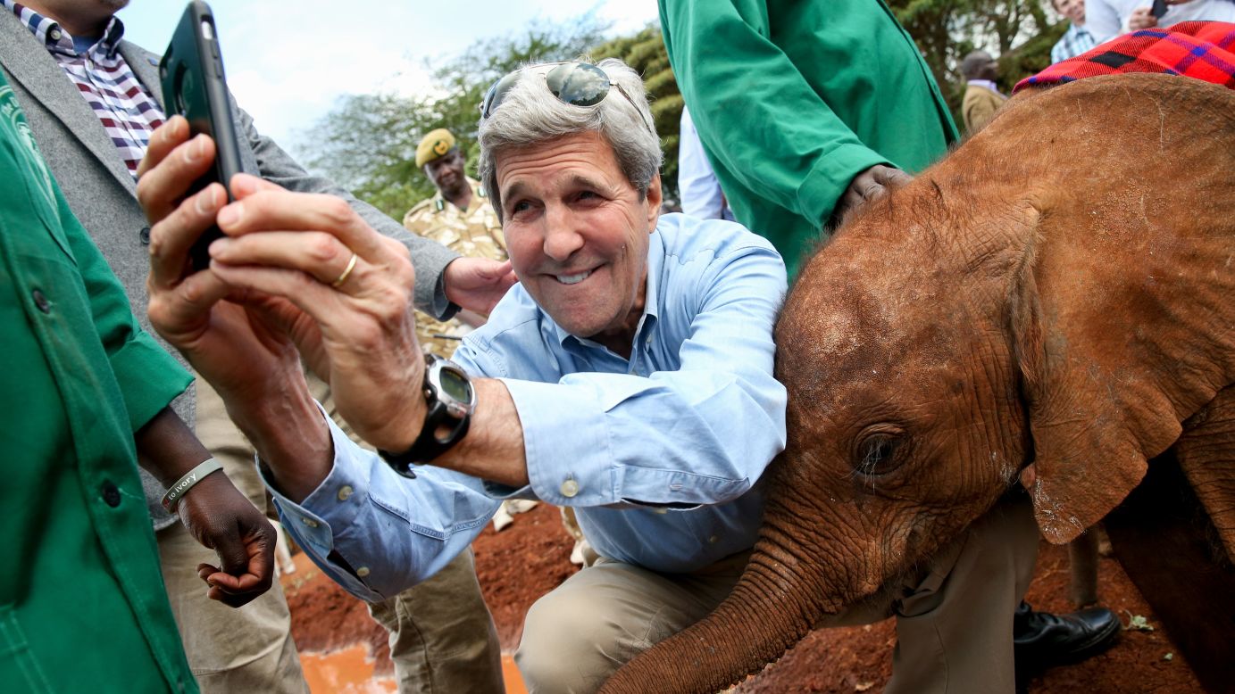 Secretary of State John Kerry takes a selfie with a baby elephant on Sunday, May 3, while touring an elephant orphanage in Nairobi, Kenya.