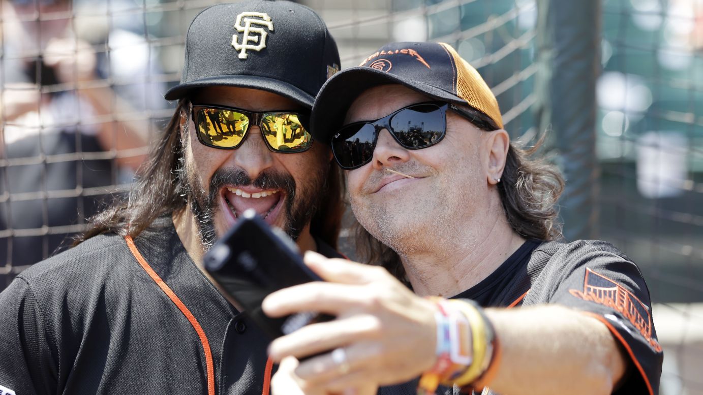 Metallica musicians, drummer Lars Ulrich, right, and bassist Robert Trujillo, take a selfie before a baseball game on Saturday, May 2, between the San Francisco Giants and Los Angeles Angels in San Francisco. 
