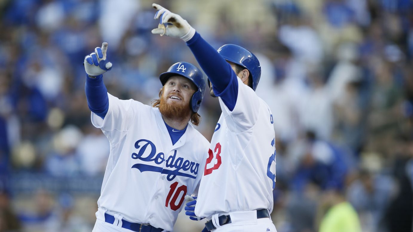 Los Angeles Dodgers player Justin Turner, left, celebrates his solo home run against the Arizona Diamondbacks by pretending to take a selfie with teammate Adrian Gonzalez on Saturday, May 2, in Los Angeles. <a href="http://www.cnn.com/2015/04/29/living/gallery/selfies-look-at-me-0429/index.html" target="_blank">See 20 selfies from last week.</a>