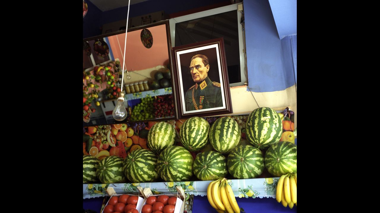 Mustafa Kemal Ataturk's portrait hangs in a grocery store on the European side of Istanbul. Photographer Ersoy Emin spent several years capturing the country's love-affair with its founder.