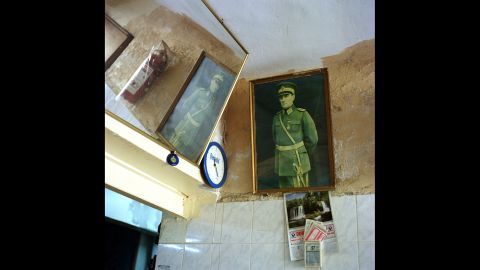 "I was not so interested in the compulsory images of Ataturk you see in banks or in the main square but more of ones that you see tucked away in little cafes, small car garages and little businesses, and people's own images of him," said Emin. Here, a portrait hangs in an automobile repair shop in Istanbul.