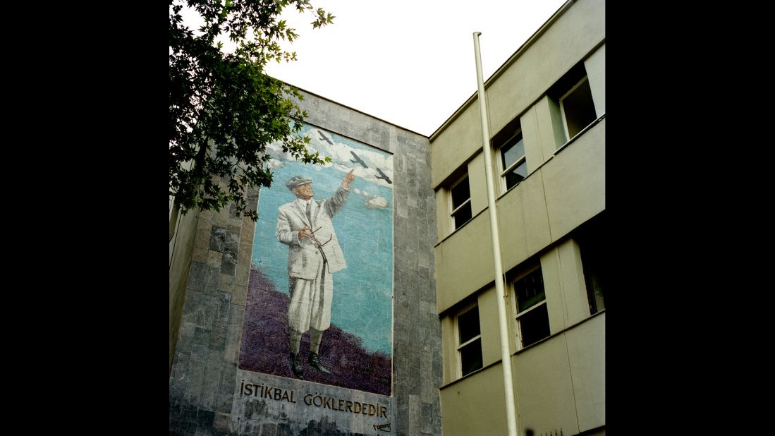 A mural of Ataturk featuring his famous quote on aerospace and aeronautics, "Istikbal gôklerdedir" (The future is in the skies) is seen on the side of a building in the capital city Ankara.