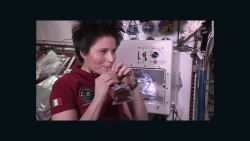 Italian astronaut Samantha Cristoforetti sips espresso on the International Space Station.